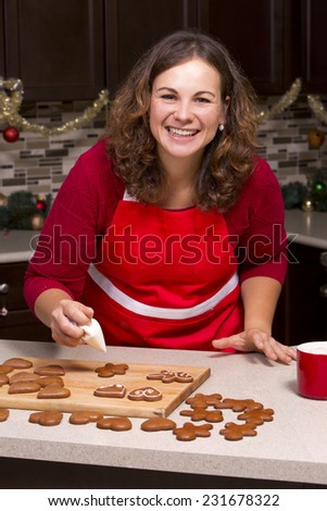 woman making ginger bread cookies in the kitchen