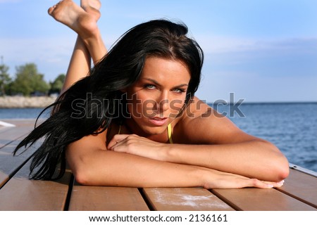 stock photo strong fitness brunette model wearing yellow bikini on the 