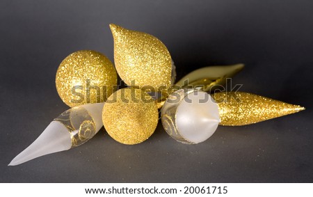 beautiful gold seasonal Christmas decorations on dark background