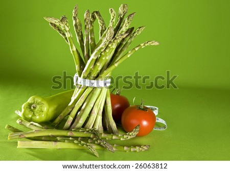 Image (sans Emile) Stock-photo-fresh-green-bunch-of-asparagus-on-green-background-26063812