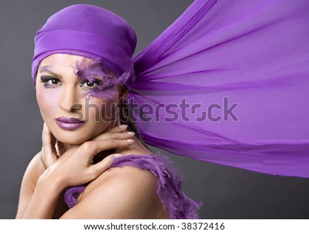 stock photo : pretty brunette wearing purple outfit and matching makeup stock photo : pretty brunette wearing purple outfit and matching makeup