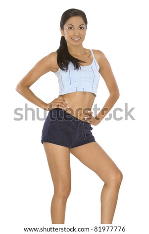 pretty brunette wearing sport outfit on white background