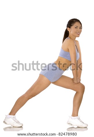 pretty asian woman wearing sport outfit on white