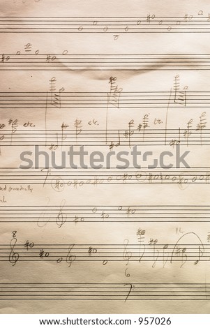 Handwritten Musical Score on Staff Paper