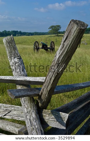 A cannon framed by rail fence posts at Antietam Civil War Battlefield in Sharpsburg, Maryland, USA
