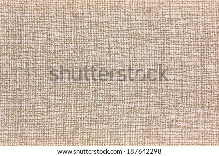 Canvas surface structure with light scratches, brown colored background texture