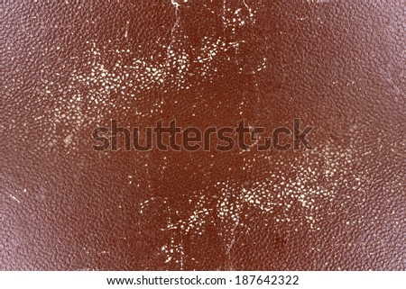 Cardboard surface structure with light scratches, brown colored background texture