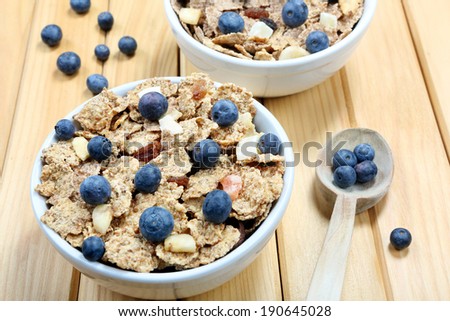 Healthy whole grain muesli and bran breakfast with fruits