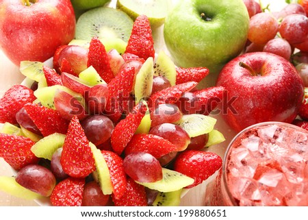 Healthy fruit salad with strawberry grape apple and kiwi - healthy breakfast