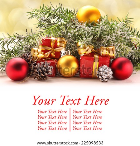 Christmas decorations with space for text on golden blurry light background
