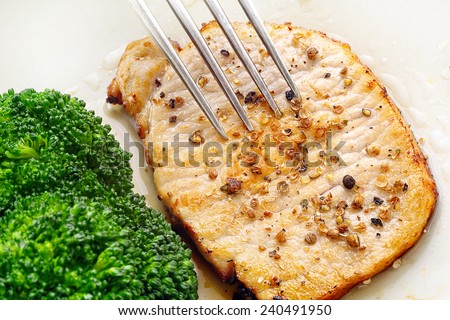 Fresh pork loin with pepper coriander and broccoli