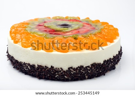 Cream cake with fruits on white background