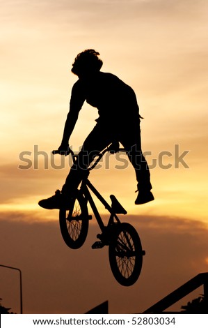 bike stunts photos. boy playing Bicycle Stunts