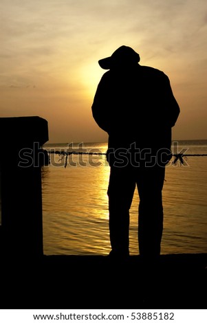 Old man at jetty