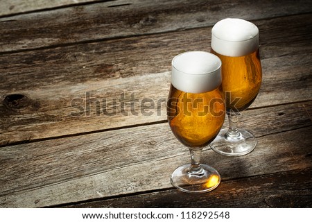 Two Glass Beer On Wood Background With Copyspace