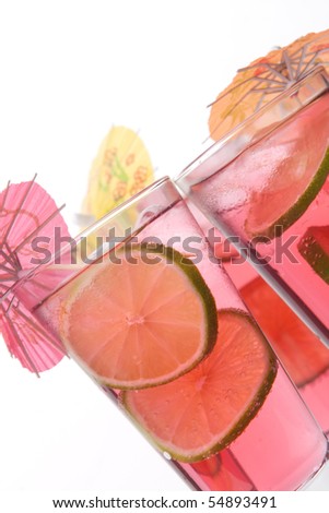 Cool, fresh, red cocktail with lime on a white background