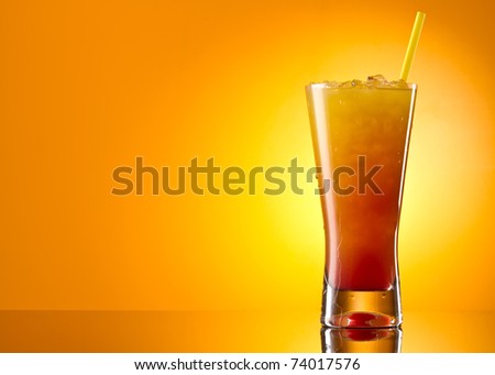 Tequila sunrise Cocktail isolated on a orange background
