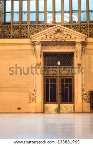 NEW YORK CITY - JAN 4: Antique door in Vanderbilt Hall in historic Grand Central Terminal in NYC on Jan 4  2013.  This Beaux Arts 12,000-square-foot hall once served as a   waiting room.