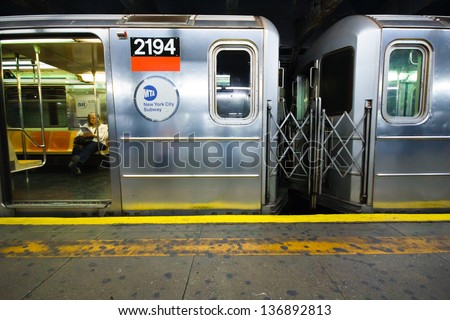 New York City - Apr 20, 2012: Subway Car With Passenger In Nyc At Station On Apr 20, 2012. Nyc Subway Is One Of The Oldest Most Extensive Public Transportation Systems In The World With 468 Stations