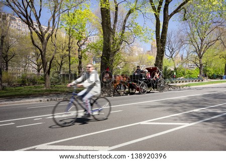 NEW YORK CITY - APR 26:  West Drive at Central Park in New York City on April 26, 2013. Central Park is a  National Historic Landmark since 1962 and is the most visited urban park in the USA.