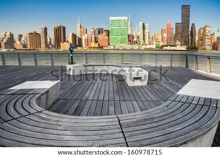 LONG ISLAND CITY, NY - SEPT 19:  Seating area at scenic Gantry Plaza State Park in Long Island City, NY on Sept 19 2013.  This park on the Queens waterfront offers views of midtown Manhattan.