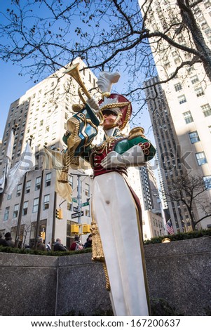 NEW YORK CITY - DEC 13: Toy soldier at Rockefeller Center in NYC on Dec 13, 2013. Declared a National Historic Landmark Rockefeller Ctr. is home to the iconic NYC Christmas Tree and skating rink.