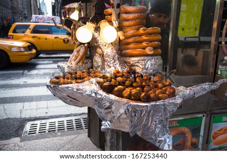 New York City - Dec 13: Chestnuts Roasting On Street Vendor Food Cart In Manhattan On Dec 13, 2013. Roasted Chestnuts Are A Seasonal Treat Sold During The Holiday Season In New York City.
