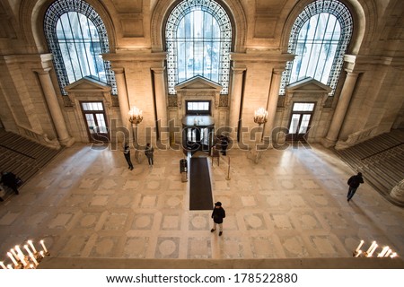 NEW YORK CITY - FEB. 10, 2014: Grand entrance at main branch of the New York Public Library. This landmark branch on 5th Avenue opened in 1911