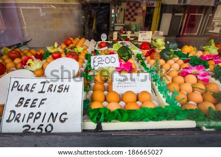 KILKENNY, IRELAND - MARCH 28, 2013: Colorful market window along streets of Kilkenny Ireland with traditional Easter eggs on display on Holy Thursday.