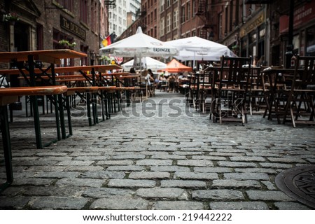 NEW YORK CITY - AUG. 3, 2014:  View of outdoor dining area on historic Stone Street in the Financial District in lower Manhattan.