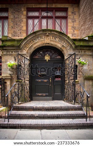 NEW YORK CITY - AUGUST 3, 2014:  Dubliner Irish pub on historic Stone Street in Manhattan\'s Financial District.