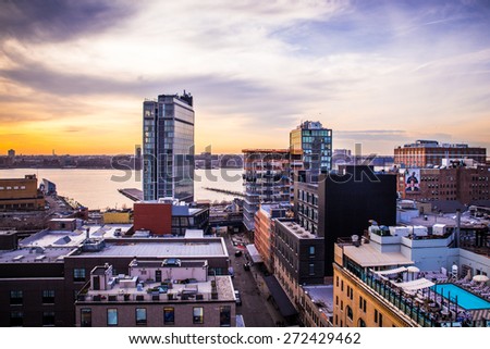 NEW YORK CITY - APRIL 6, 2015:  View across Manhattan Meatpacking District and Chelsea from above, at sunset with The Standard Hotel in view.