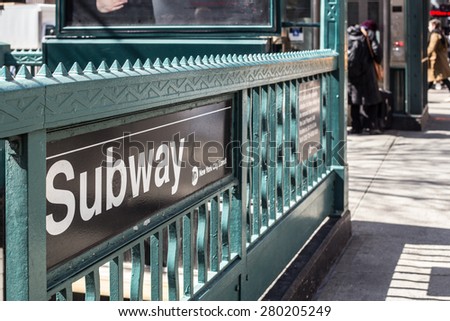 NEW YORK CITY, NY - MARCH 14, 2014:  street view entrance to one of the 468 subway stations operated by the MTA in New York City