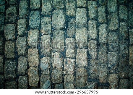 Old cobblestone road close-up