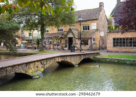 BOURTON-ON-THE-WATER, UK - OCTOBER 12, 2014:  View of scenic Bourton on the Water in the Cotswolds.