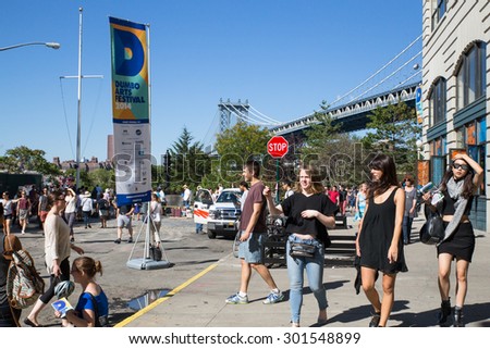 BROOKLYN, NEW YORK - SEPTEMBER 27, 2014:  Street view of the DUMBO Arts Festival in Brooklyn, New York City.