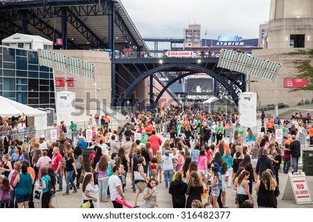 FOXBORO, MASSACHUSETTS - SEPTEMBER 12, 2015:  Fans await entry into Gillette Stadium, home of the New England Patriots,  for the One Direction concert.