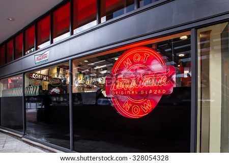 WASHINGTON, DC - AUGUST 8, 2015: View of the Krispy Kreme Doughnut storefront in Washington DC at Dupont Circle.