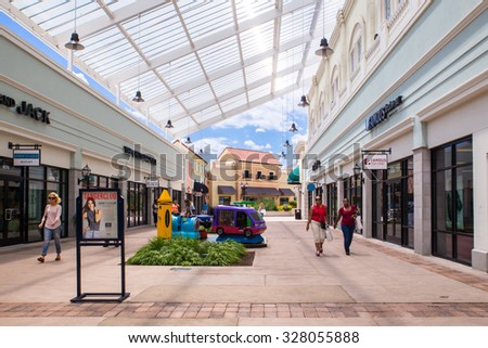 DEER PARK, NY - JULY 22, 2015: View of Tanger Factory Outlet outdoor shopping mall on Long Island, NY
