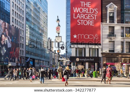 NEW YORK CITY - DECEMBER 12, 2013: Street view of Macy\'s Herald Square in midtown Manhattan at Christmas holiday crowd
