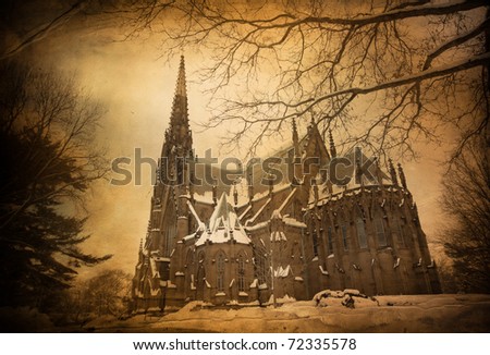 Original artist\'s Gothic church in the winter.  This is an aged and textured photographic image of a beautiful, ornate Gothic Church in the winter.