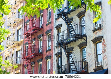 Row of historic New York City tenement apartments from the 19th century