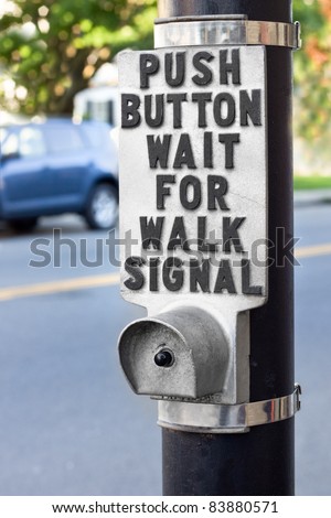 Push button for traffic signal at a typical pedestrian crosswalk