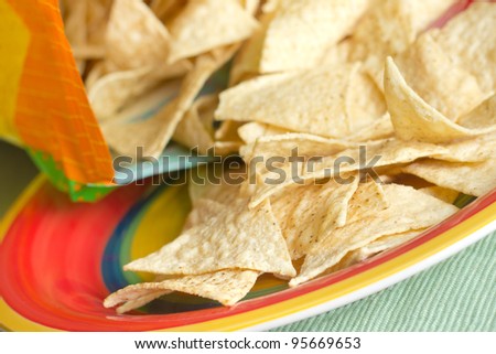 Crispy tortilla chips from snack bag