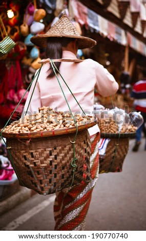 Woman Carrying Peanut Baskets - Golden Triangle, Thailand