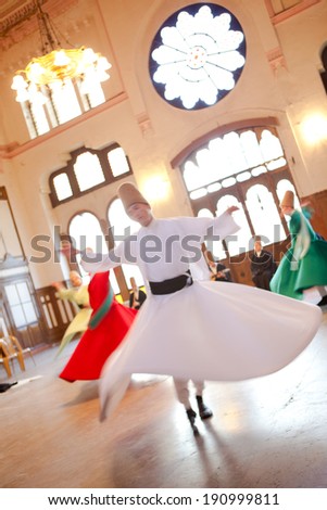 ISTANBUL - JUNE 18: Whirling Dervishes perform a sacred mevlana dance at Serkeci Train Station on June 18, 2011 in Istanbul, Turkey.