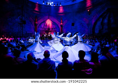 ISTANBUL - MAY 20: Whiriling dervishes perform religious dance ceremony on May 20, 2011 in Istanbul.