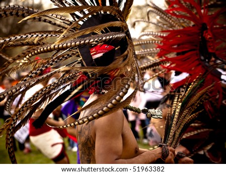 WASHINGTON DC - MARCH 21: Group demonstrates native aztec dance in traditional garb at the pro-illegal immigration march in Washington DC, March 21 2010.