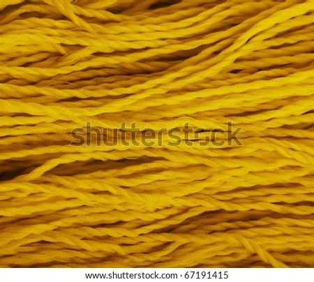 Yellow woolen thread closeup