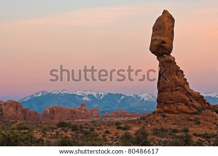 Gravity defying Balanced Rock at sunset. This thing is as tall as a 13 story building! Arches National Park, Utah